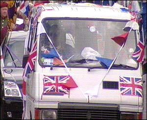 A colourful display on a van driving in the parade 