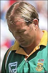 Jacques Kallis returns to the pavilion after being dismissed by Darren Gough