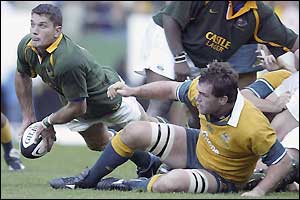 South Africa scrum-half Joost van der Westhuizen spreads the play