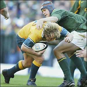 Australia flanker Phil Waugh tries to break through a tackle