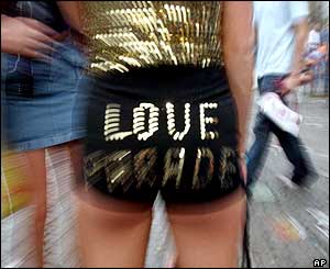 Woman with Love Parade written on her pants