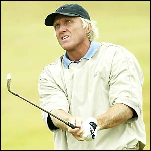 Greg Norman plays a pitch shot