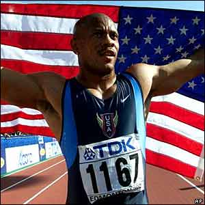 Maurice Greene picks another gold medal for the USA in the 100m 