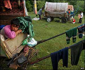 Gypsies sleep under the plastic that covers their wagons