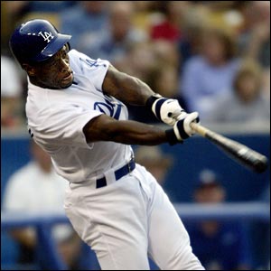 Rickey Henderson gets the first hit for the LA Dodgers in their MLB game against the St Louis Cardinals