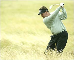 Phil Mickelson plays out of the rough
