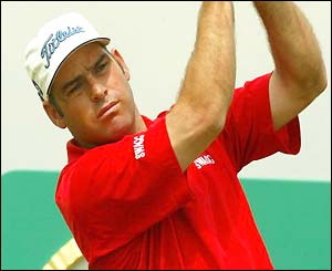 Hennie Otto plays his tee shot