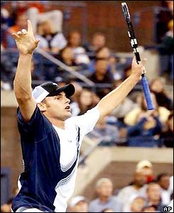 Andy Roddick celebrates beating Xavier Malisse