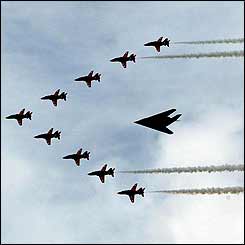 The Red Arrows and an F-117 stealth bomber