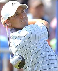 Sergio Garcia follows through after a tee shot