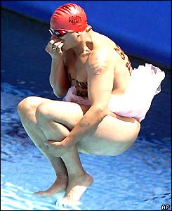 A streaker in a tutu jumps into the pool in Barcelona
