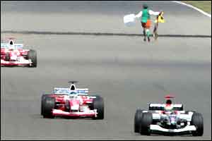 High drama on lap 12 as a spectator finds his way onto the track