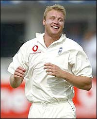 Andrew Flintoff celebrates taking the wicket of South Africa's Andrew Hall