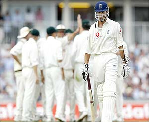 England captain Michael Vaughan walks from the crease after being dismissed by Shaun Pollock