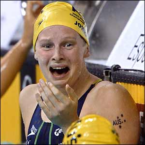Leisel Jones celebrates breaking the women's 100m breaststroke world record