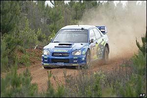 Petter Solberg of Norway gains third place after special stage six during the first leg of the Rally Australia