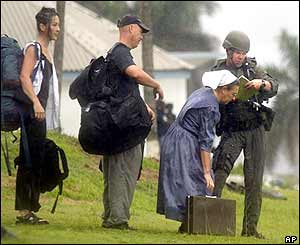 Aid workers are evacuated by US marines