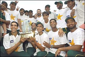 The Pakistan team celebrate winning the match and claiming a series whitewash