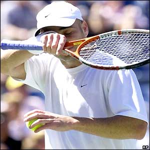 Andre Agassi wipes his brow