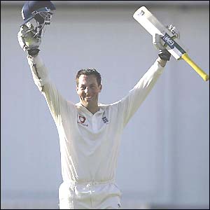 Marcus Trescothick raises both arms to salute his double century