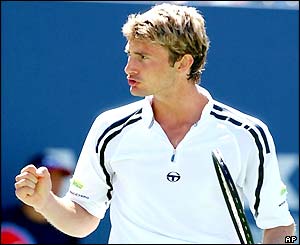 Juan Carlos Ferrero punches the air with delight