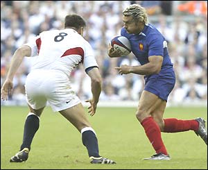 Martin Corry of England prepares to tackle Christian Labit