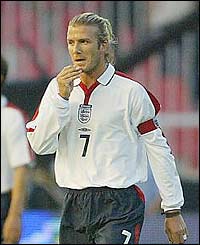 David Beckham looksa glum after Macedonia take the lead 