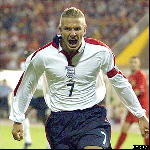 David Beckham celebrates after scoring his penalty 