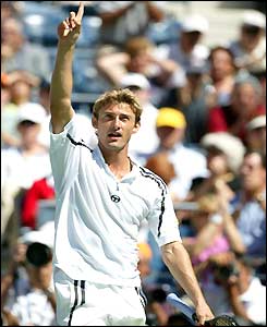 Juan Carlos Ferrero salutes the crowd