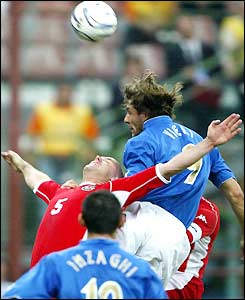 Christian Vieri climbs above Robert Page to head a goal