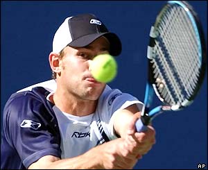 Andy Roddick plays a double-handed forehand 