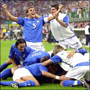 The Italian players celebrate