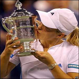 Henin-Hardenne takes the title to complete a remarkable comeback from exhaustion following her brave semi-final win over Jennifer Capriati