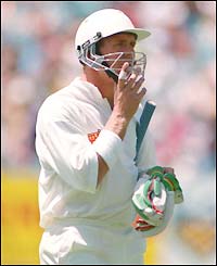 Alec breaks his right index finger in Australia in 1994