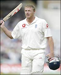 Flintoff salutes the crowd after reaching his half-century
