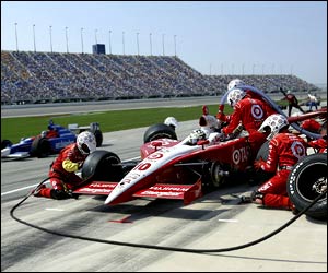 Tomas Scheckter pits in his Toyota at the Chicagoland Speedway