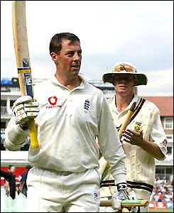 Marcus Trescothick raises his bat as he leaves the field