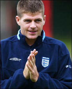 Steven Gerrard rubs his hands before England training
