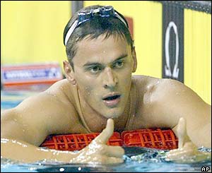 Russia's Alexander Popov celebrates winning the gold medal 