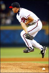 Atlanta Braves pitcher Jung Keun Bong is hit by a line drive 