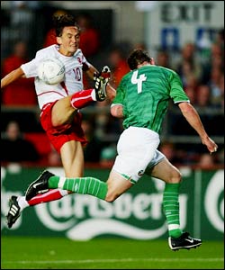 Ireland's Andy O'Brien defending