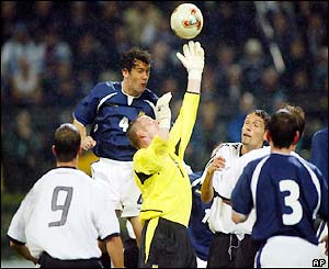 Scotland keeper Robert Douglas fails to hold a Ballack shot and Germany score
