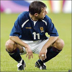 Scotland's Neil McCann looks dejected after the match