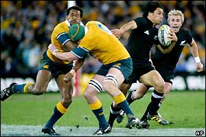 New Zealand wing Doug Howlett causes chaos in the Australian defence