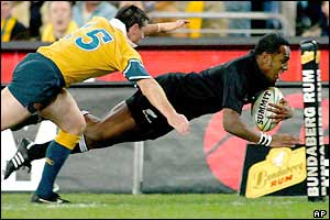 New Zealand wing Joe Rokocoko dives for the corner to score