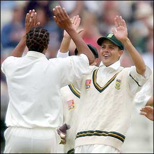 Makhaya Ntini (left) celebrates taking his second wicket