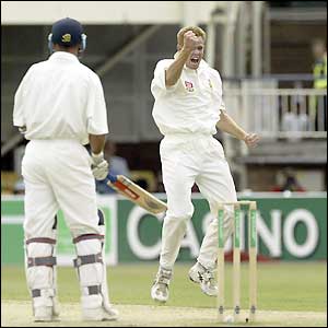 England captain Nasser Hussain is given out while South Africa bowler Shaun Pollock celebrates