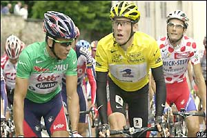 Robbie McEwen rides alongside Lance Armstrong on the final stage
