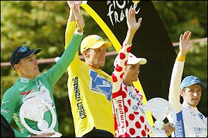 The jersey winners join Armstrong on the podium