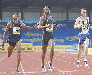 Daniel Caines (centre) wins the men's 400m in front of Du'aine Ladejo, left, and Ian Mackie 